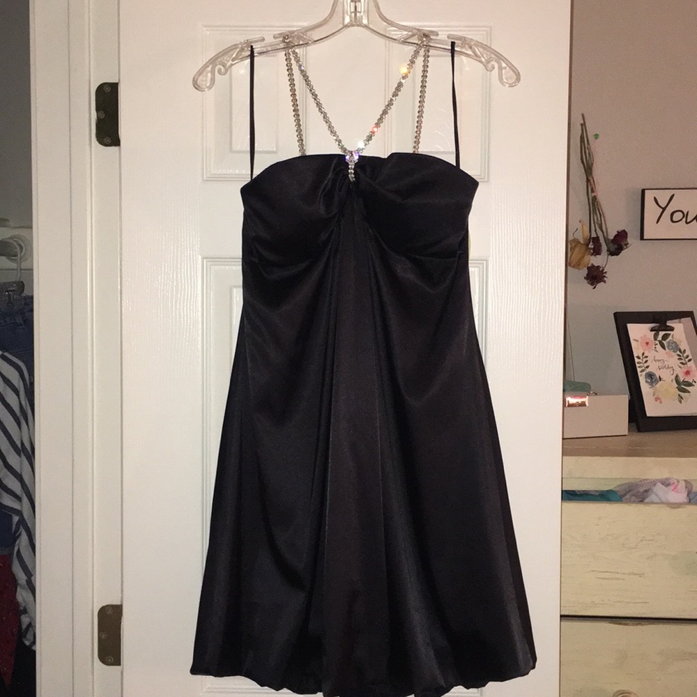 Black mini dress, with jeweled halter neck line